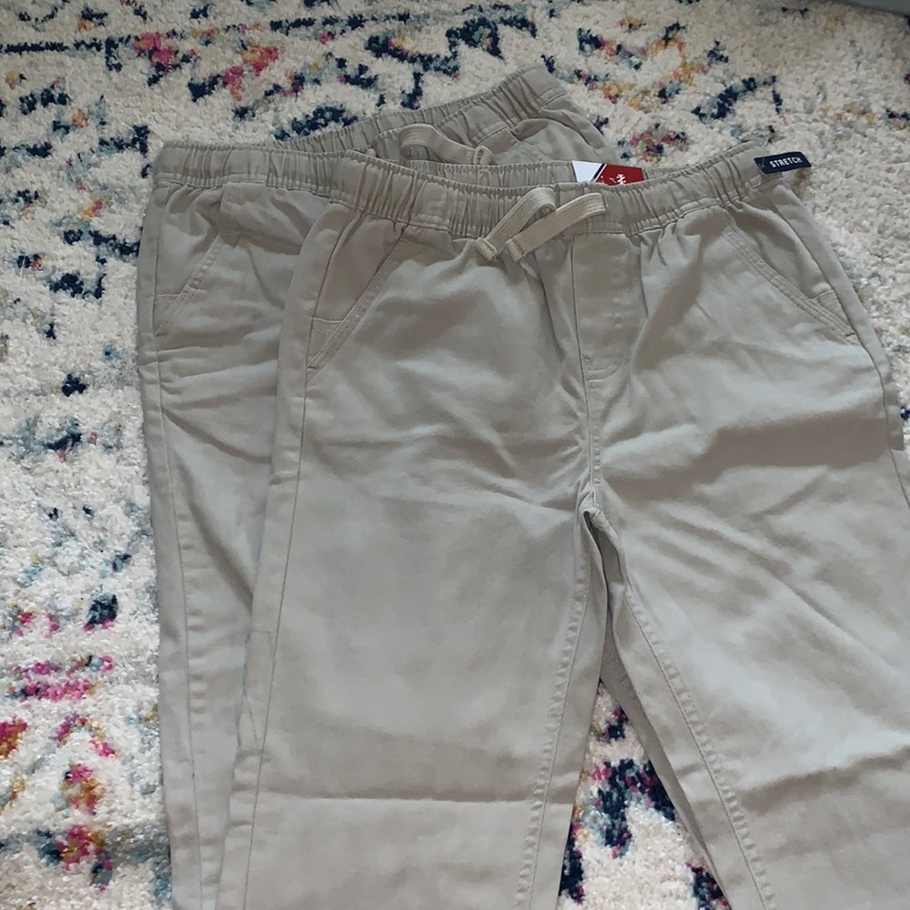 Two pairs of boys IZOD khaki joggers